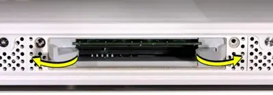 Moving the DIMM ejector clips to their fully open position