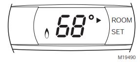 Honeywell T8775A Non-Programable Thermostat User Guide - indicator points to Room