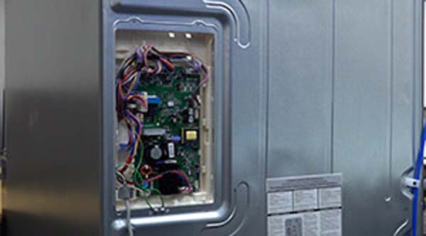 This refrigerator DIY repair guide shows how to replace an electronic control board in bottom-freezer, top-freezer and side-by-side refrigerators. The electronic control board is the "brains" of the refrigerator that controls major components such as the compressor and fans. During a refrigerator electronic control board failure, the refrigerator can't cool correctly. It won't cool at all if the control board relay that turns on the compressor fails, which is the most common problem with a refrigerator control board (other failed parts can prevent the control board from running, such as the start device or overload fuse). Another symptom of a refrigerator control board failure is that fans, lights or other components aren't working. For a reliable diagnosis, have a local refrigerator repair expert test the refrigerator electronic control board. If you need to replace it, use the manufacturer-approved fridge part that fits your model. This repair procedure works for Kenmore, LG, Samsung, Whirlpool, KitchenAid, Maytag, Amana, Frigidaire, Electrolux, GE, Bosch, JennAir and Daewoo refrigerators that have the electronic control board mounted on the back cabinet panel.