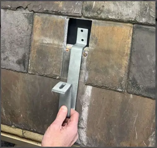 Genius Roof Solutions Flashing Solution for Bracket Mounting on Slate Roofs - bracket into position