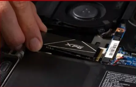 XPG DDR4 RGB Memory Module - ALIGN THE M.2 SLOT AND INSERT THE SOLID STATE DRIVE